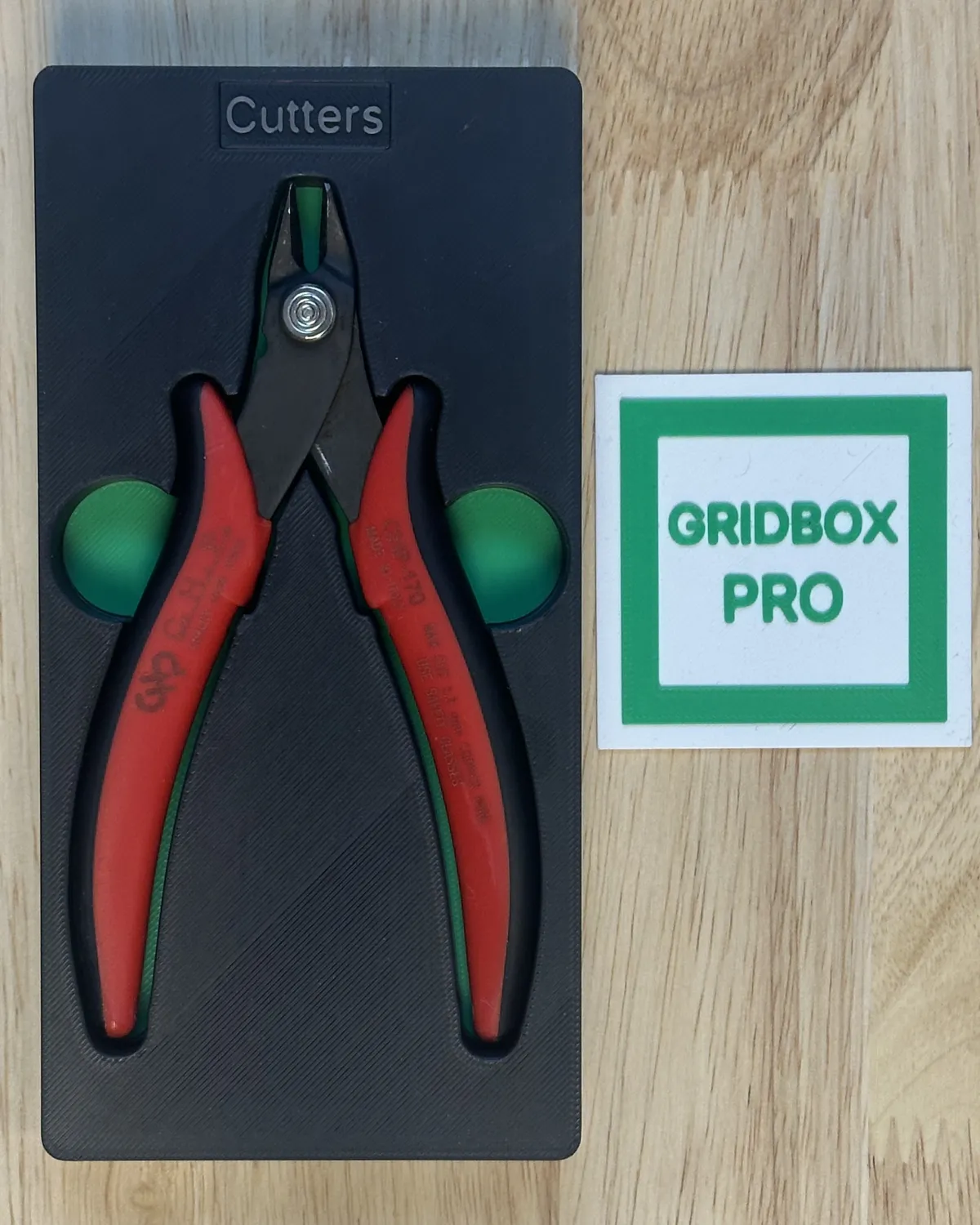 The printed shadowbox with the same wire cutters in it, photographed from the same spot